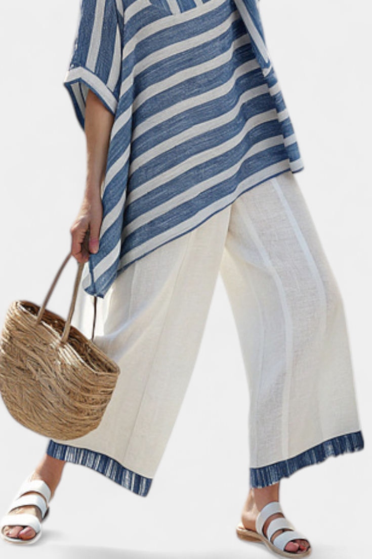 Elegant Mediterranean Linen Set with Blue Stripes and Trousers with a Hem for a Fresh and Chic Look