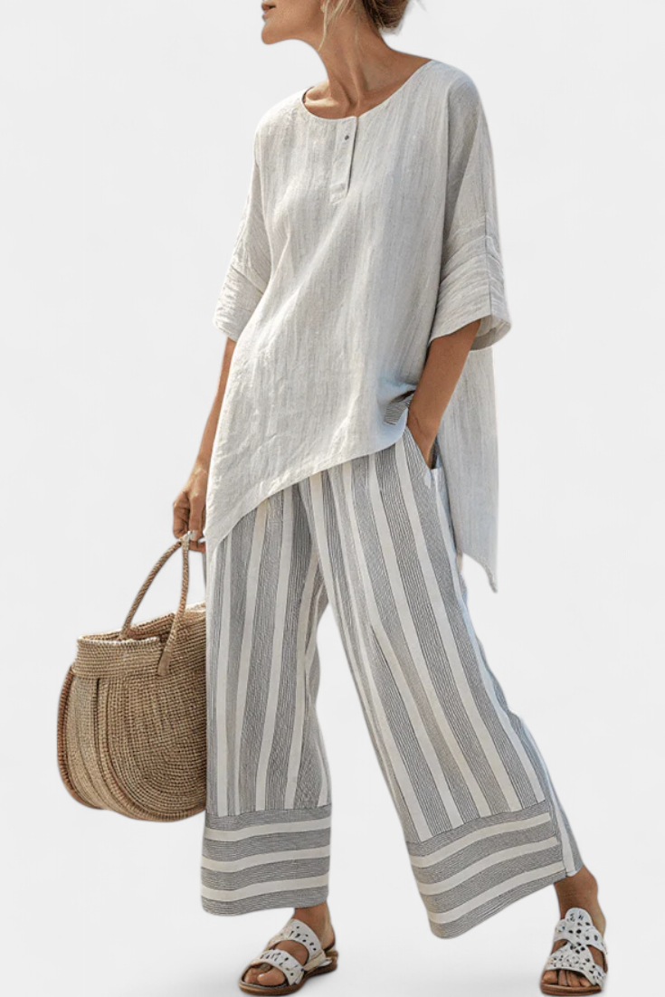 Daisy Set with Asymmetric Top and Striped Trousers for a Modern and Elegant Style
